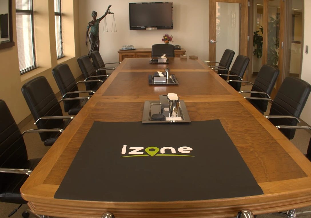 The iZone Corp conference room, with the iZone logo on the table